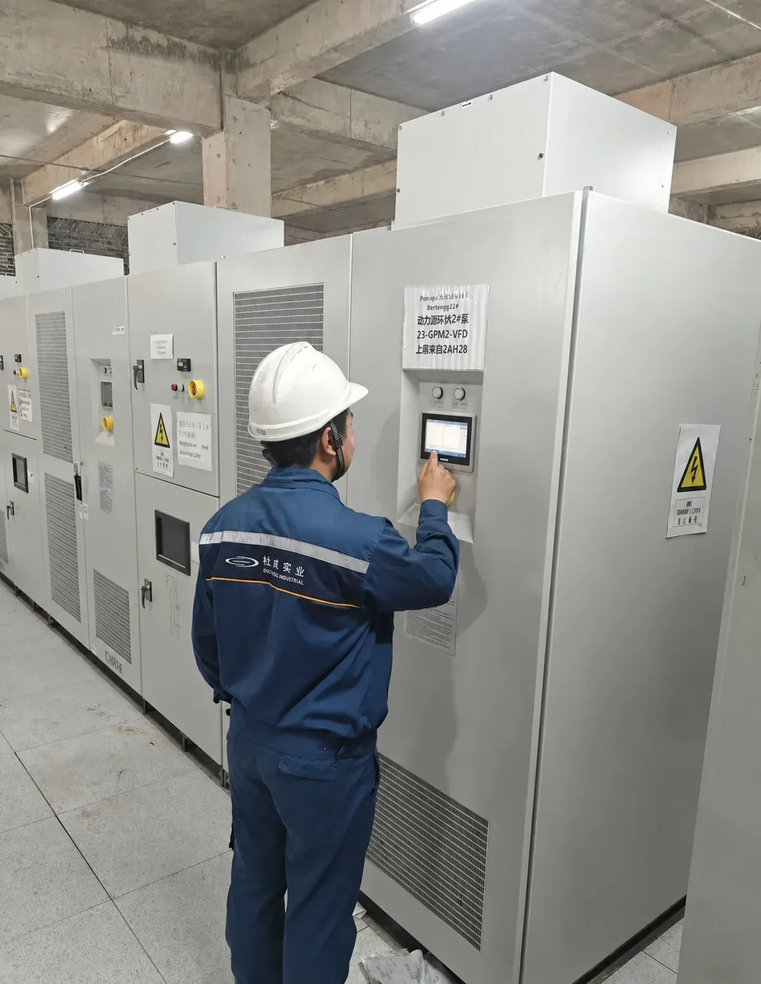 DUCHENG engineer commissioning drive cabinets at the Hanrui nickel project in Indonesia
